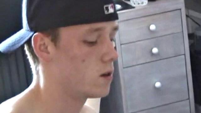 We join EJ and Adam with their cocks out and pants down. Curious, EJ leans over and starts stroking Adam's dick. Adam reciprocates by going down on EJ. EJ tries sucking dick by taking Adam's cock into his mouth.