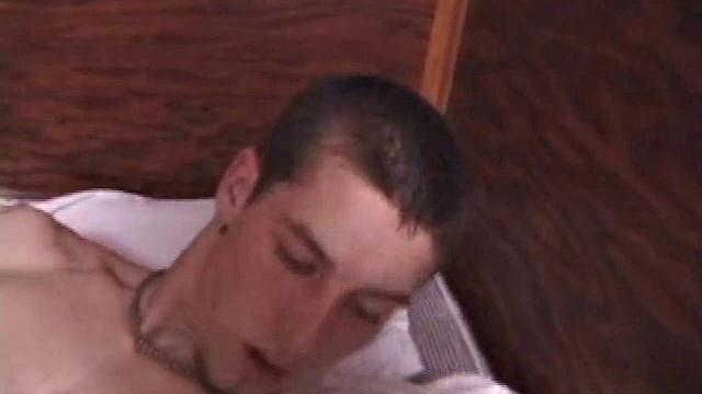 As Adam thumbs through a porn magazine, his cock quickly gets stiff. Next he makes good use of an anal sex toy and shows his ambidextrous talents by sliding a dildo in and out of his ass while stroking.