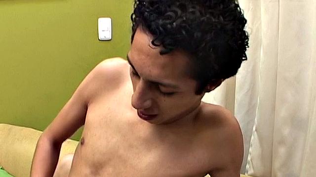 Juan Carlos has his eyes on skinny Latin boy Wilmer and it's not long before the two twinks are stripping each other naked. Big uncut dicks are sucked stiff, then Juan slides his monster into Wilmer's little ass.