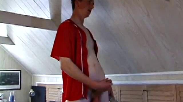 Derek is rubbing his cock through his sweat pants, before stripping them off to show us what he's packing. With the remote control in one hand and his lubed meat in the other, Derek comments on the size of his cock, asking if we like it.