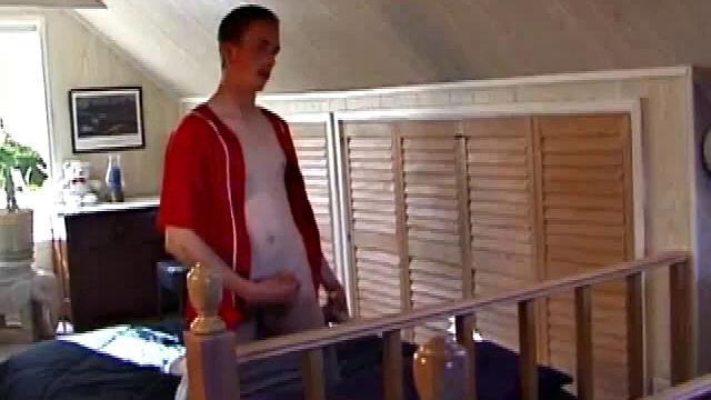 Derek is rubbing his cock through his sweat pants, before stripping them off to show us what he's packing. With the remote control in one hand and his lubed meat in the other, Derek comments on the size of his cock, asking if we like it.