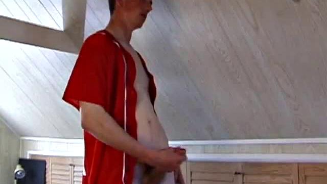 Derek is rubbing his cock through his sweat pants, before stripping them off to show us what he's packing. With the remote control in one hand and his lubed meat in the other, Derek comments on the size of his cock, asking if we like it.