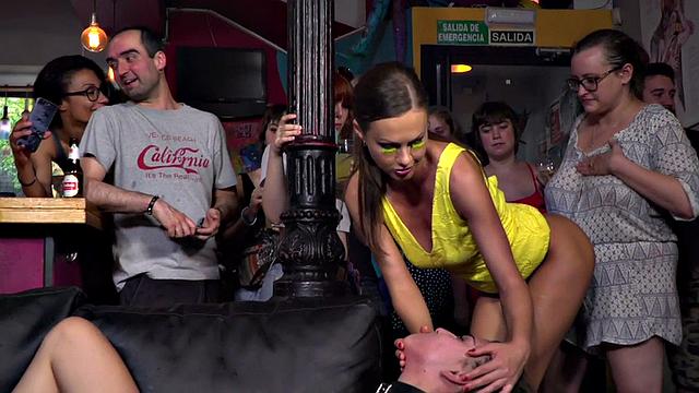 Public BDSM babe whipped and fingered in voyeuristic scene