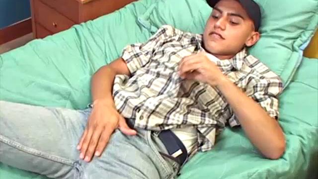 This Latin boy next door seems to be having a great time, stripping off his clothes and showing us that smooth young body of his.