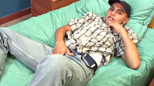 This Latin boy next door seems to be having a great time, stripping off his clothes and showing us that smooth young body of his.