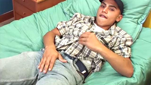 This Latin boy next door seems to be having a great time, stripping off his clothes and showing us that smooth young body of his.