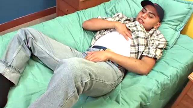 This Latin boy next door seems to be having a great time, stripping off his clothes and showing us that smooth young body of his.