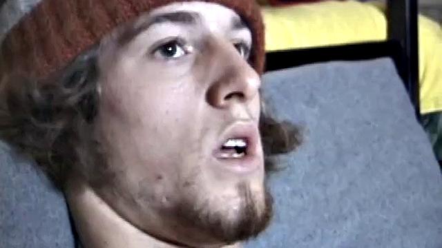 Adam relaxes on the floor watching porn video, strokes cock, plays with butthole, and blasts cum load onto skateboard