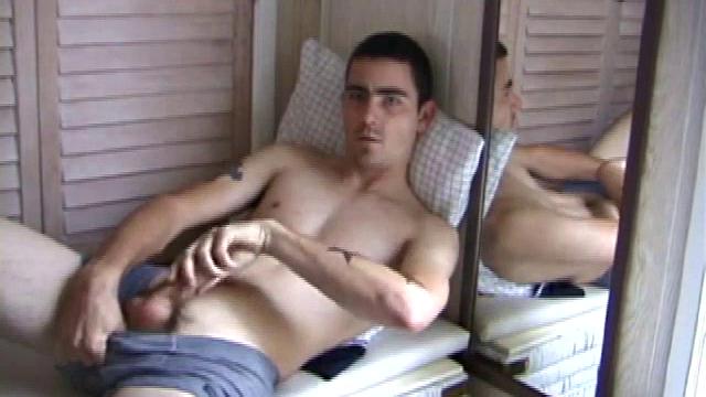 Dan Doe just got a new porn movie and can't wait to give it a test drive. He strips off the boxer briefs and gets to work on his cock. He pumps like a machine up and down on his shaft, and with the other, he gropes hid ass and tugs on his balls.