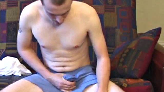 It's been a few days since Ethan busted his nut, so he gets busy right away. Soon he has a very impressive and veiny cock poking out of his boxers.