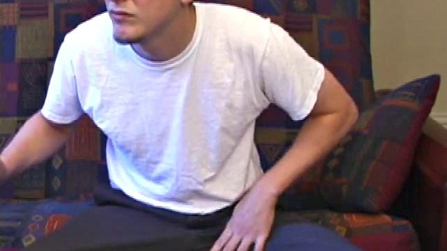 It's been a few days since Ethan busted his nut, so he gets busy right away. Soon he has a very impressive and veiny cock poking out of his boxers.