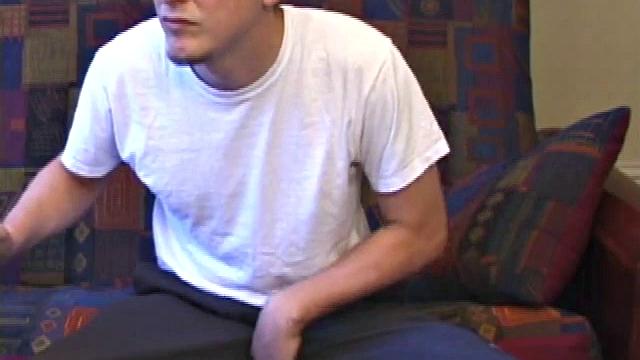 It's been a few days since Ethan busted his nut, so he gets busy right away. Soon he has a very impressive and veiny cock poking out of his boxers.