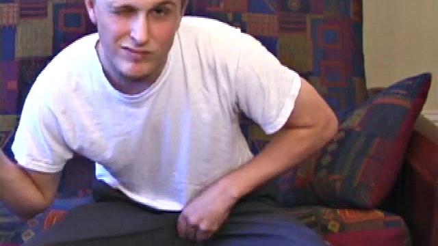 It's been a few days since Ethan busted his nut, so he gets busy right away. Soon he has a very impressive and veiny cock poking out of his boxers.