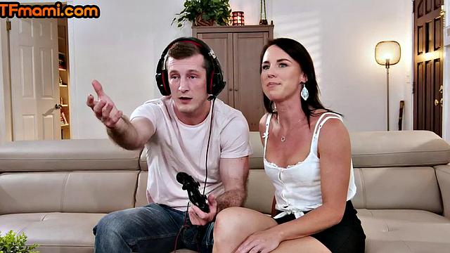 Horny MILF riding gamers cock in reverse cowgirl