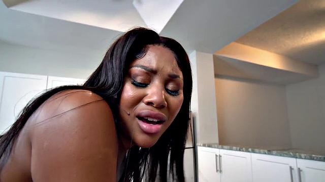 Oiled-up ebony booty licked and drilled by BBC BF in the kitchen