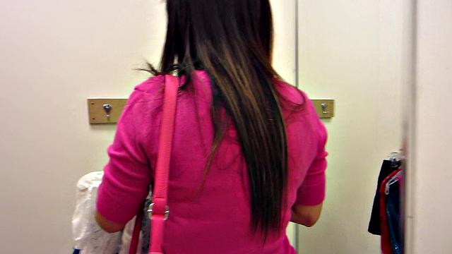 Sexy bald babe gets her pussy stuffed with dildo in the dressing room