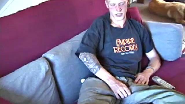 Freckled face Brandon invites us to watch him beat off. The pants strip off and an anal toy goes in while he keeps stroking along through it all.