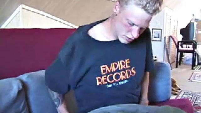 Freckled face Brandon invites us to watch him beat off. The pants strip off and an anal toy goes in while he keeps stroking along through it all.