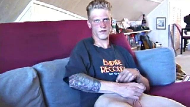 Freckled face Brandon invites us to watch him beat off. The pants strip off and an anal toy goes in while he keeps stroking along through it all.