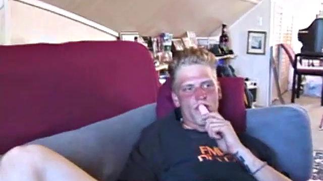 Freckled face Brandon invites us to watch him beat off. The pants strip off and an anal toy goes in while he keeps stroking along through it all.