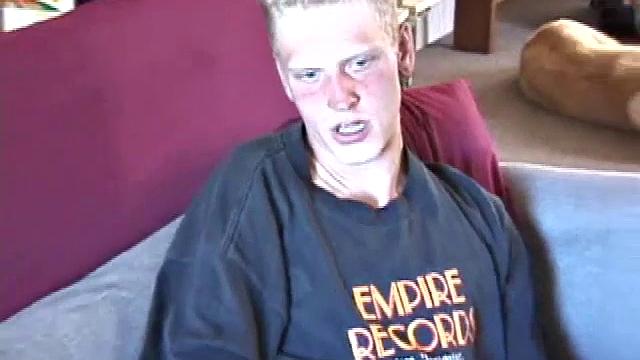 Freckled face Brandon invites us to watch him beat off. The pants strip off and an anal toy goes in while he keeps stroking along through it all.