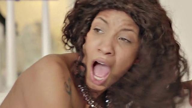 Busty Ebony rides her man's black cock on the couch