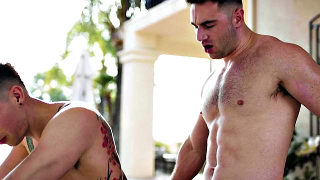 Athletic stud bareback banged by inked BF outdoors on terrace