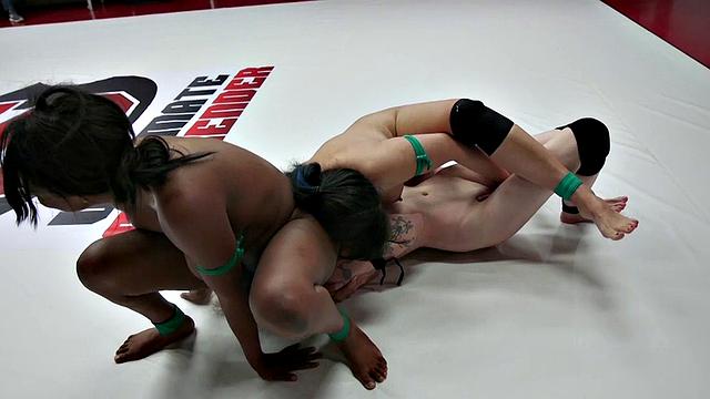 Lesbian big boobed and big ass MILFS enjoy public wrestling