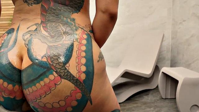 Inked tgirl shaking her booty before anal
