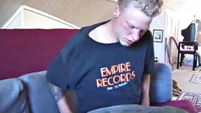 Freckled face Brandon invites us to watch him jack off, which really turns him on. The pants strip off and his anal toy goes in, Brandon keeps stroking along through it all.