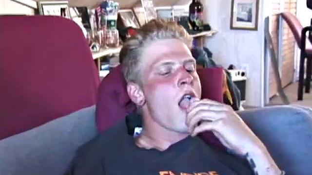 Freckled face Brandon invites us to watch him jack off, which really turns him on. The pants strip off and his anal toy goes in, Brandon keeps stroking along through it all.