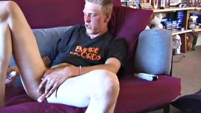 Freckled face Brandon invites us to watch him jack off, which really turns him on. The pants strip off and his anal toy goes in, Brandon keeps stroking along through it all.