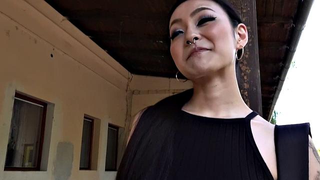 Tattooed Asian babe pickedup and paid for sex from behind