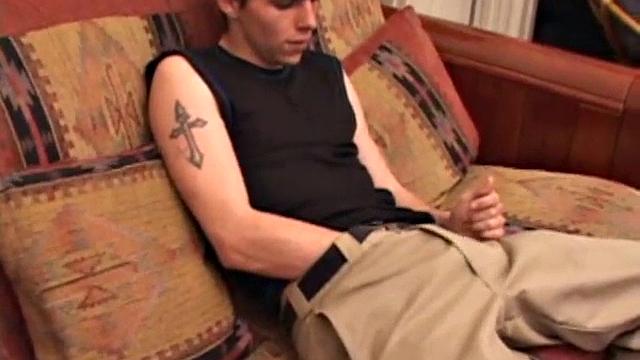 After rubbing up a boner through his pants, Sean unzips and starts stroking his hard dick. He pleasures himself with his tongue, eats his pre-cum, and plays with his balls. After some hard stroking, Sean pumps out a huge cum load.