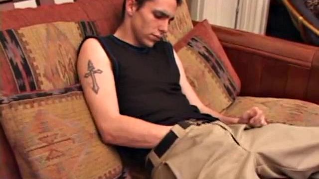 After rubbing up a stiff one, Sean unzips and starts stroking his hard cock and pleasures himself with his tongue. He eats his pre-cum, plays with his balls, and pumps out a huge cum gushing load.