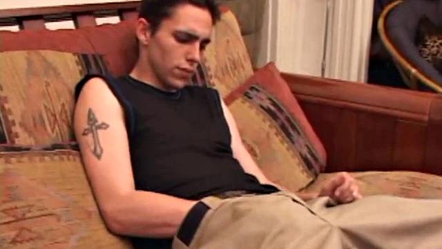 After rubbing up a stiff one, Sean unzips and starts stroking his hard cock and pleasures himself with his tongue. He eats his pre-cum, plays with his balls, and pumps out a huge cum gushing load.