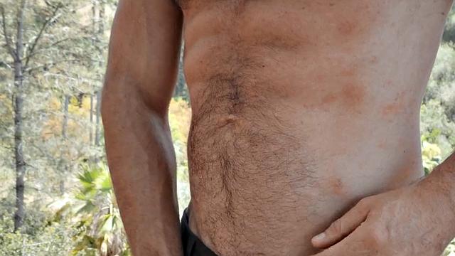 Hairy chest jock stroking in close up solo video