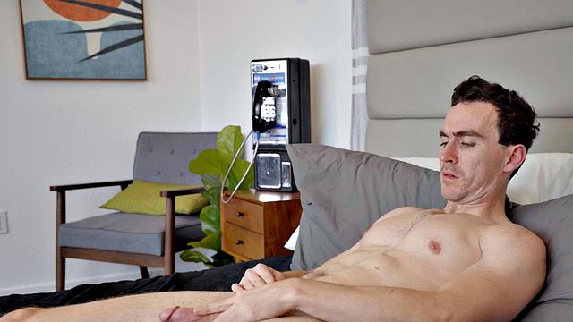 Dirty jock enjoys jerking huge cock while cumming