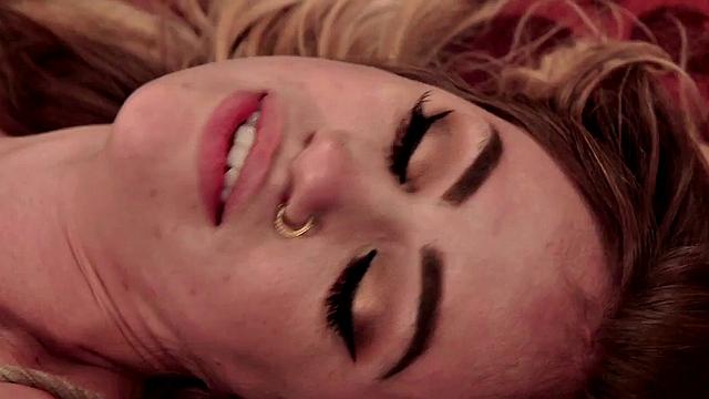 Predicament bondage sub massaged and spanked by lezdom