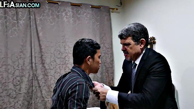 Gay businessman gets fucked by Asian skinny twink in office