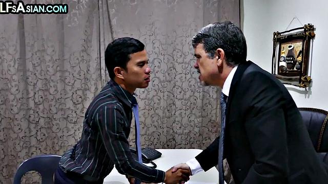 Gay businessman gets fucked by Asian skinny twink in office