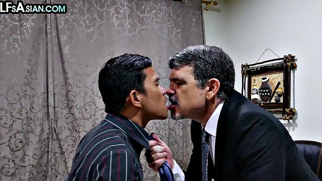 Gay businessman gets fucked by Asian skinny twink in office