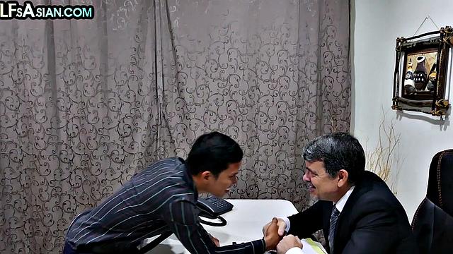 Gay businessman gets fucked by Asian skinny twink in office