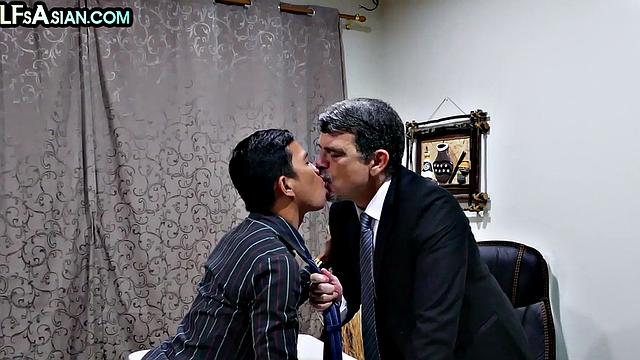 Gay businessman gets fucked by Asian skinny twink in office