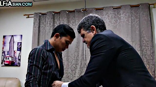 Gay businessman gets fucked by Asian skinny twink in office