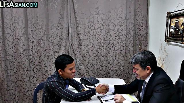 Gay businessman gets fucked by Asian skinny twink in office