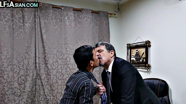 Gay businessman gets fucked by Asian skinny twink in office