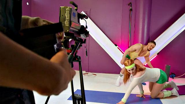 Curvy redhead tgirl sucked before sex in workout gear