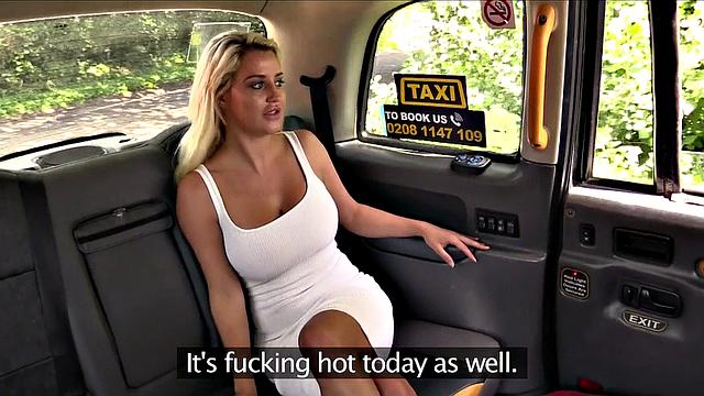 Blonde bombshell with big tits enjoys outdoor car ride with her bald pussy in sunshine