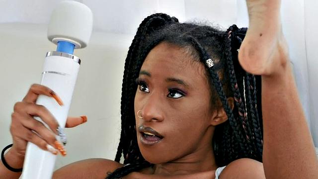 Squirting ebony scissoring with busty MILF after toyed